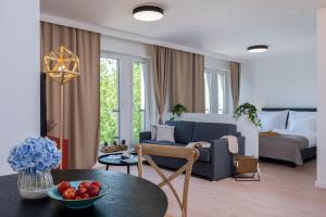 Un lugar para sentarse en EXCLUSIVE Aparthotel Kraków Lubicz 40