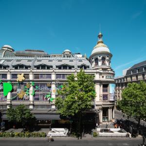 a large building with a dome on top of it at Joro Living in Paris