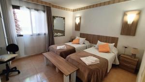 Tempat tidur dalam kamar di Casa Isabel, the perfect home for your holidays in Corralejo