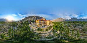 a building on the side of a mountain at LOKAL x Skardu (City Center) in Skardu