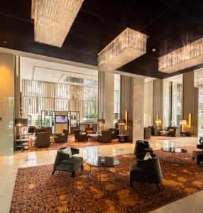 Eastin Grand Hotel Sathorn tesisinde bir oturma alanı