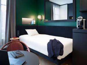 Posteľ alebo postele v izbe v ubytovaní ibis Styles Dijon Central