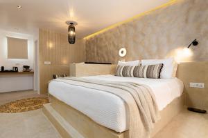 Krevet ili kreveti u jedinici u okviru objekta Villa Kelly Rooms & Suites