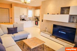 O zonă de relaxare la Easy Stay Residences