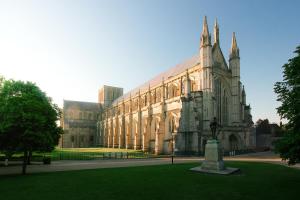 a large building with a statue in front of it at Tastefully Decorated 1-Bed with Free Parking - At Hem in Winchester