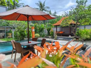 The swimming pool at or close to Serangan Inn Mimba