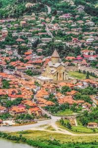 an aerial view of a town with orange roofs at Levanto in Mtskheta