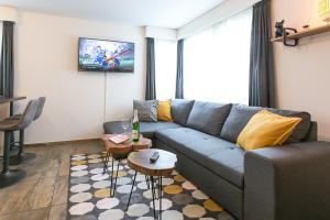 A seating area at Spirit Apartments - Studio 2 - Küche - Parkplatz