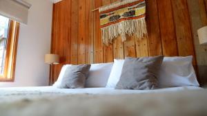 Cama ou camas em um quarto em Patagonia Route B&B