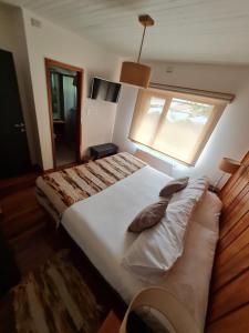 Cama ou camas em um quarto em Patagonia Route B&B