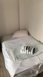 Кровать или кровати в номере COMFORT AND SEAVIEW APARTMENT NEA PARALIA