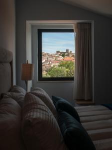 Cama ou camas em um quarto em Portalegre Palace