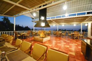 Балкон или терраса в Kodai Resort Hotel, Kodaikanal