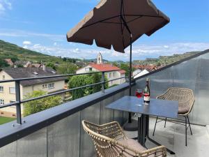 En balkon eller terrasse på Weingut & Straußwirtschaft Vogel