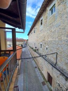 a view of a street from a balcony of a building at Bonito apartamento en Laredo in Laredo