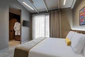 Krevet ili kreveti u jedinici u okviru objekta ASKLIPIOS LUXURY ROOMS