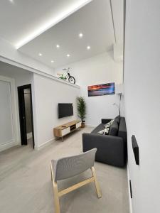 Televizors / izklaižu centrs naktsmītnē Apartamento Castillejos 4