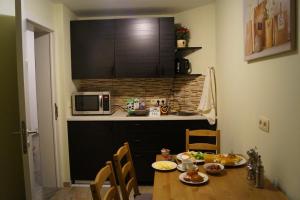 Una cocina o kitchenette en EU B&B