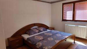 A bed or beds in a room at ENSA Apartments