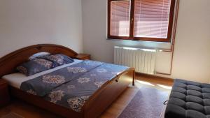 A bed or beds in a room at ENSA Apartments