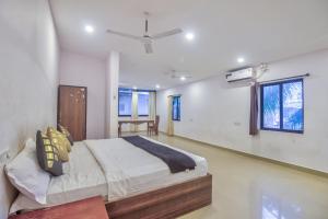 Krevet ili kreveti u jedinici u okviru objekta Homes Stay In Candolim GOA