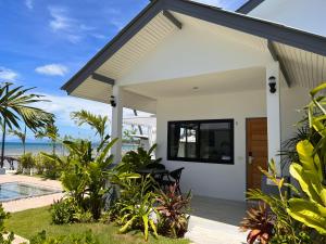 uma casa com vista para o oceano em Pearl of Samui Resort em Lamai