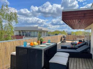 Балкон або тераса в Skyhouse Riga Lux Penthouse & SPA