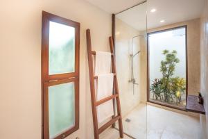 A bathroom at Rare Beachfront Villa - 2BR - 6 Pax Private Pool on Tuason Surf Spot