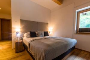 Voodi või voodid majutusasutuse Monte Vita Tirol - Apartments toas