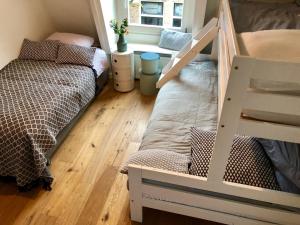 Ліжко або ліжка в номері Family Beach House Zandvoort City Center