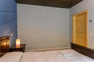 Cama ou camas em um quarto em Blend Mountain Villa