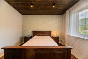 Cama ou camas em um quarto em Blend Mountain Villa