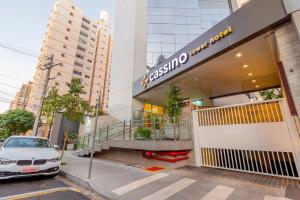 a car parked in front of a building at Hotel Cassino Tower São José do Rio Preto by Nacional Inn in Sao Jose do Rio Preto