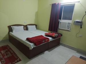 Krevet ili kreveti u jedinici u objektu Rama Guest House