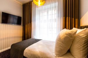 Katil atau katil-katil dalam bilik di Sleep in Hostel & Apartments Stary Rynek