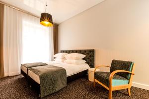 Katil atau katil-katil dalam bilik di Sleep in Hostel & Apartments Stary Rynek