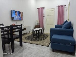 Televisi dan/atau pusat hiburan di Safiyya Homestay