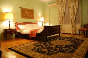 Postelja oz. postelje v sobi nastanitve Bucharest Boutique Accommodation by Hotels