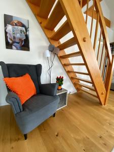 A seating area at Stylish two-floor apartment in a heart of Basel