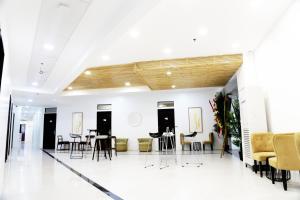 Svetainės erdvė apgyvendinimo įstaigoje Travelbee Airport Inn