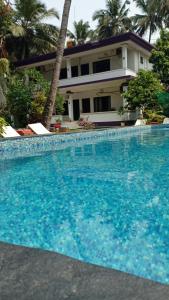 Фотография из галереи Heaven Goa Guesthouse в Бенаулиме