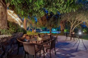 Um jardim em Alghero Resort Country Hotel & Spa