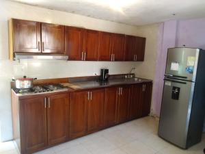 A kitchen or kitchenette at Casa de Playa Nativo