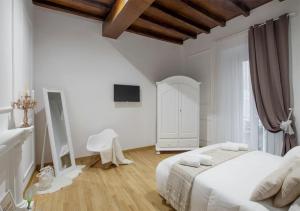 Cama ou camas em um quarto em Navona Love Apartment