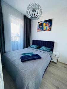 Vuode tai vuoteita majoituspaikassa Mikis apartament, Mano Jūra 2, Kunigiškiai