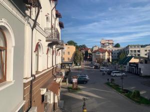 a view of a city street from a building at Richky Hotel in Truskavets