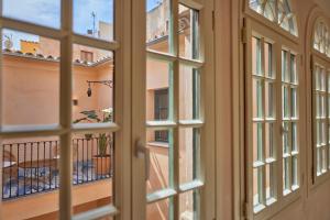 A balcony or terrace at Puro Grand Hotel