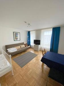 Кровать или кровати в номере Mainhatten Apartment