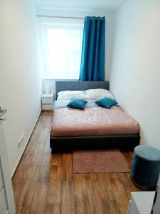 Vuode tai vuoteita majoituspaikassa AJP Apartament Szczecin Dąbie