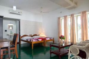 Orchid Lake View Homestay में एक कमरे में एक या कई बेड